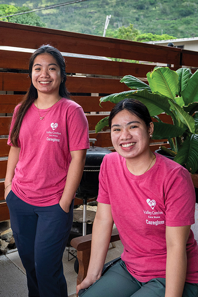 image of 2 staff members in the outdoor gardening area